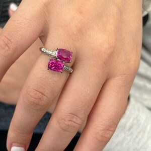 Elegant Pink Gemstones Set in Intricate Sterling Silver Band